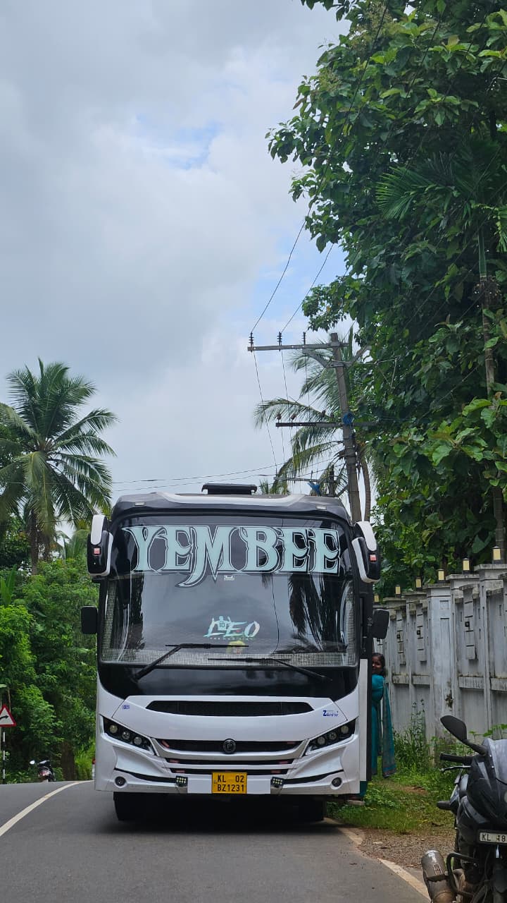 Coach on a green Kerala road